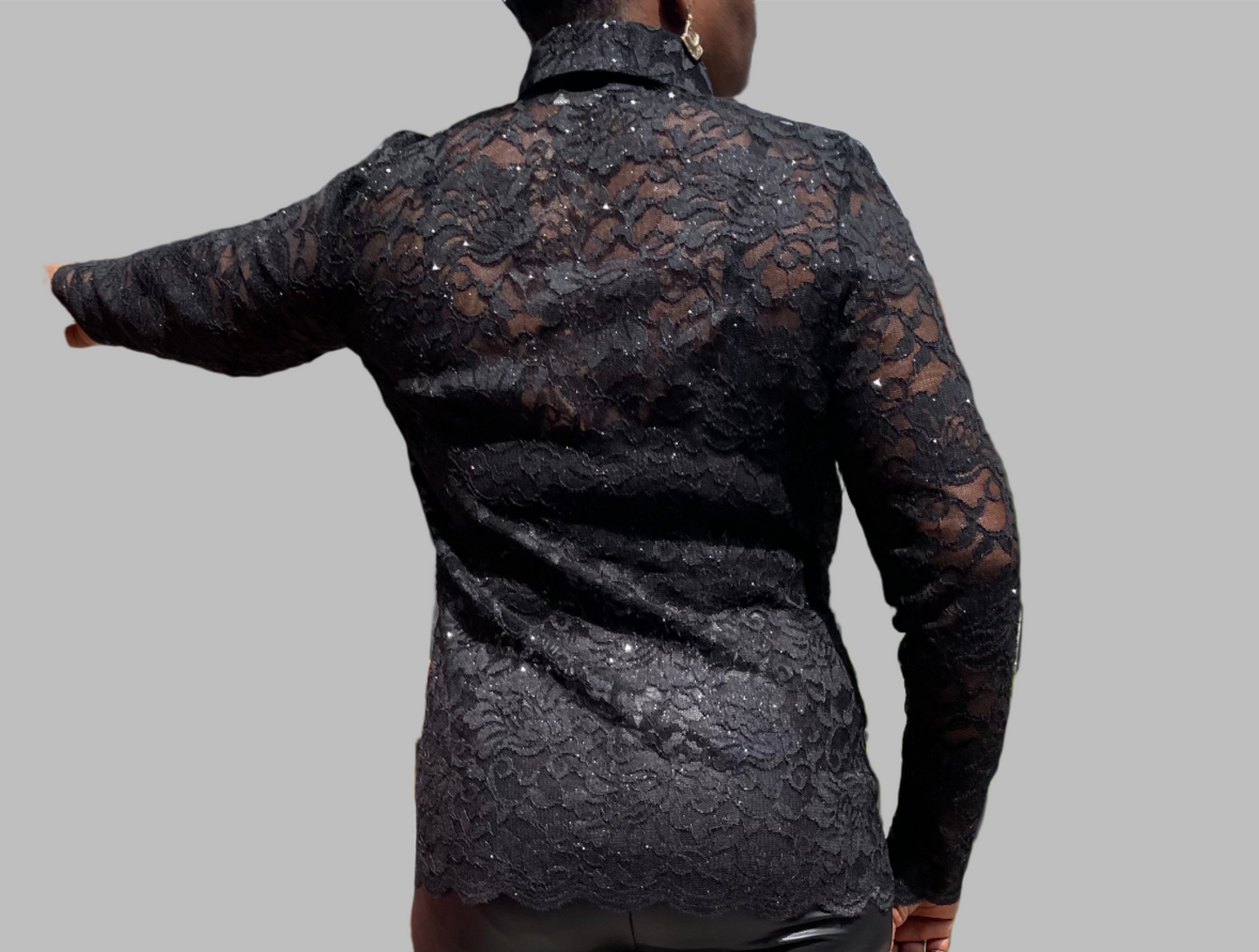 Ladies black long sleeve lace shirt.